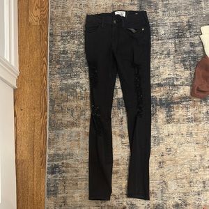 Frame ripped black jeans